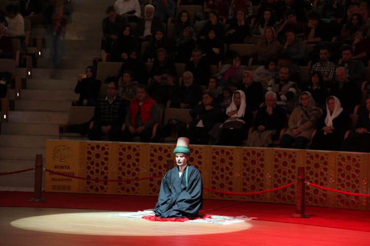 Man Sitting In Performance In Konya