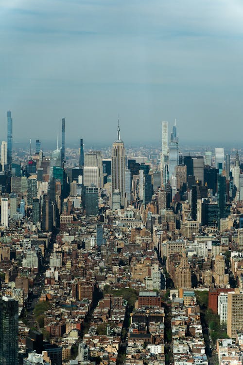 Ingyenes stockfotó Empire State Building, felhőkarcolók, függőleges lövés témában