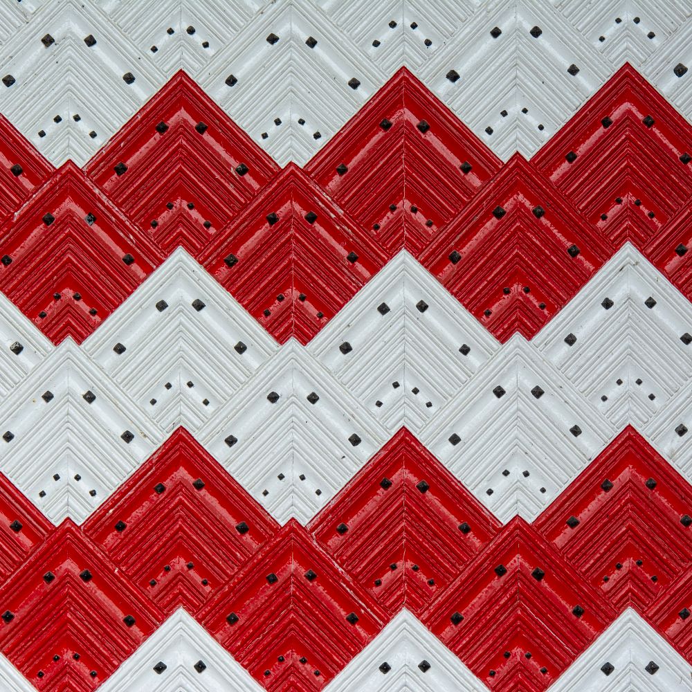 Wallpapering in Stepney — surfaces prepped and cut in by hand