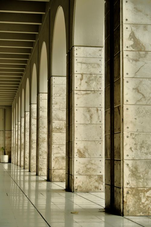 Free Stunning perspective of columns and arches in a modern building, Mérida, Mexico. Stock Photo