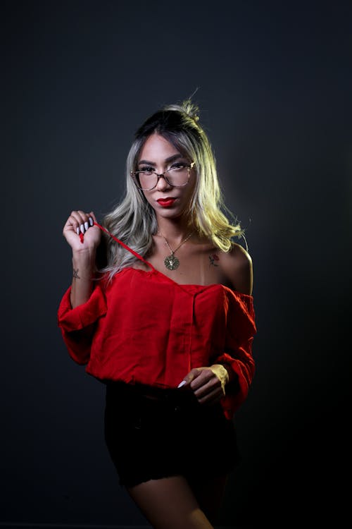 Woman in a Red Blouse with Straps