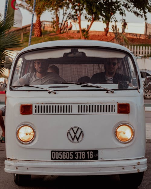 Men Sitting in Volkswagen Type 2