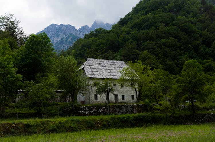 Farm House On Mountains Landscape