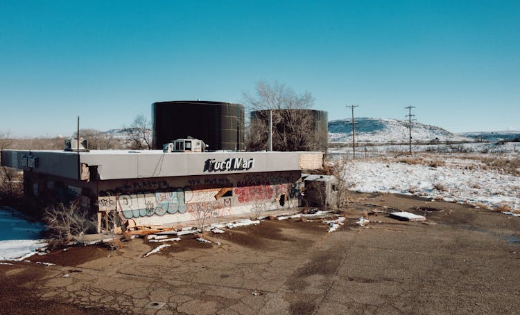 Abandoned Building In Countryside In Winter 