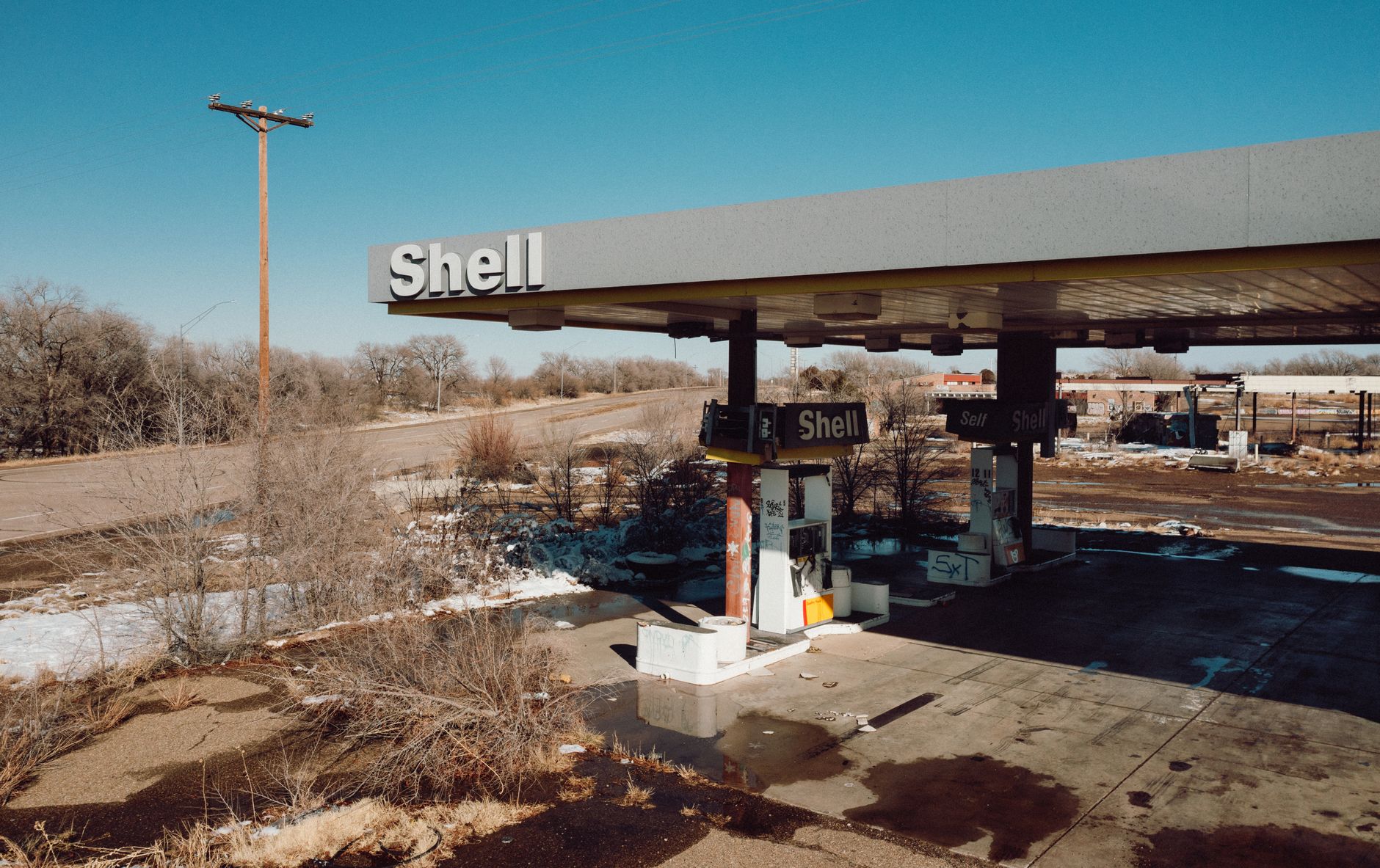 Derelict Shell gas station in Tucumcari, NM depicting decay and abandonment.