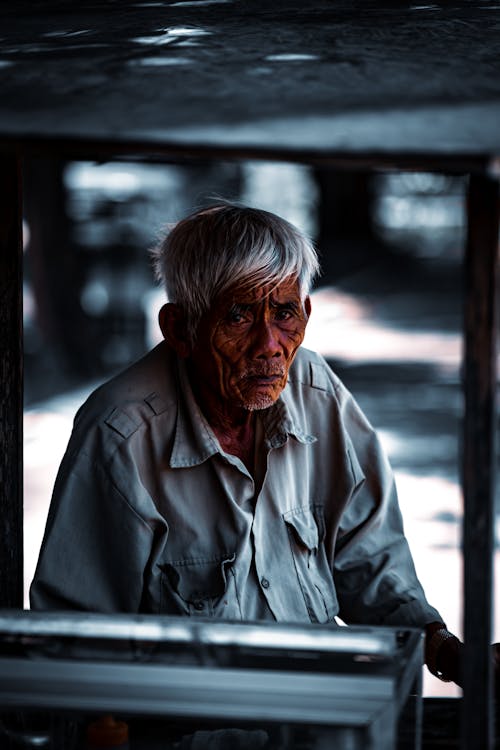 Elderly Man in Window