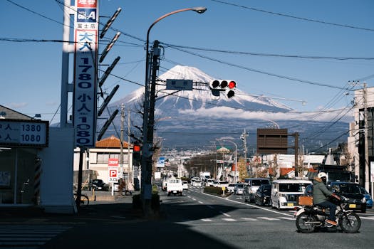 Scenic street view in Shizuoka showcasing Mount Fuji on a clear day.