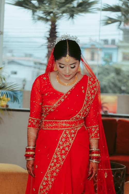 Woman Wearing a Red Bridal Lehenga 