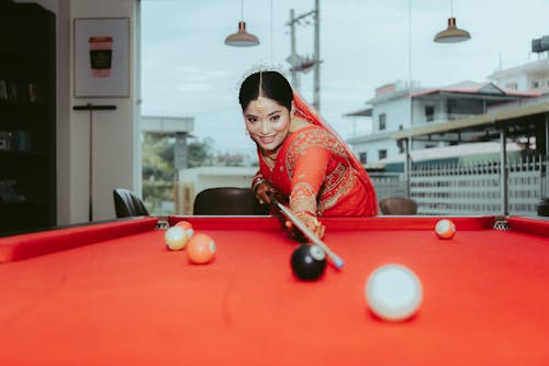 Woman Playing Billiards