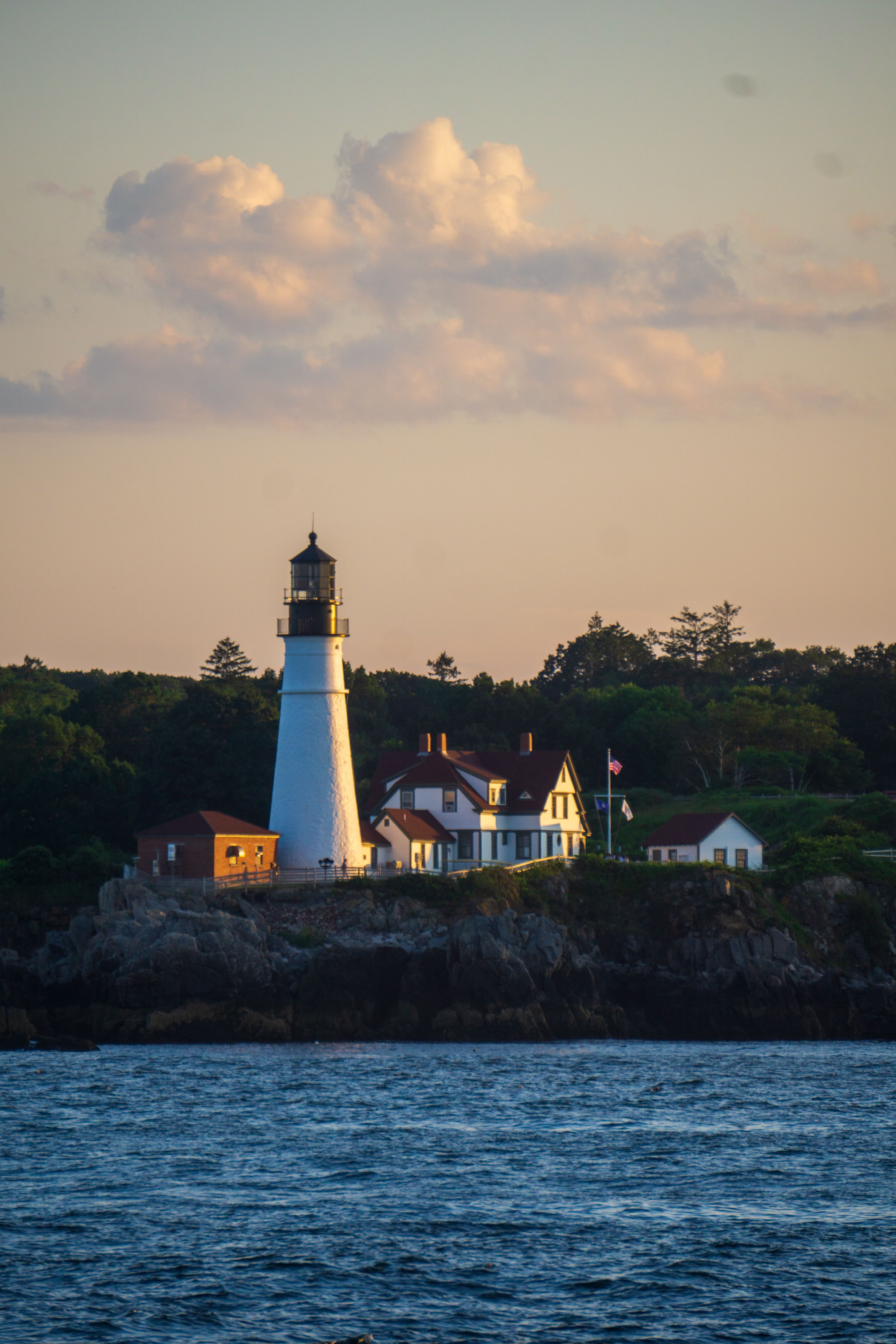 Portland Head Light from the bay at sunset