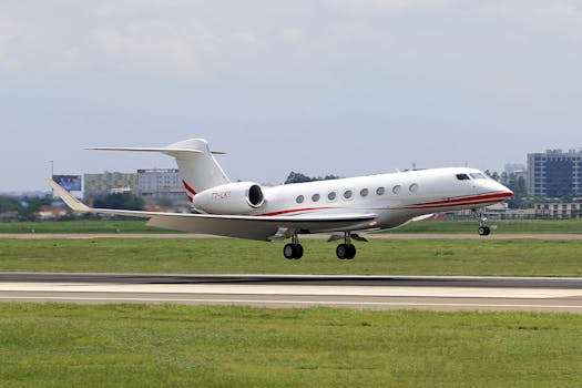 A sleek private jet takes off from an airport runway, showcasing modern aviation.