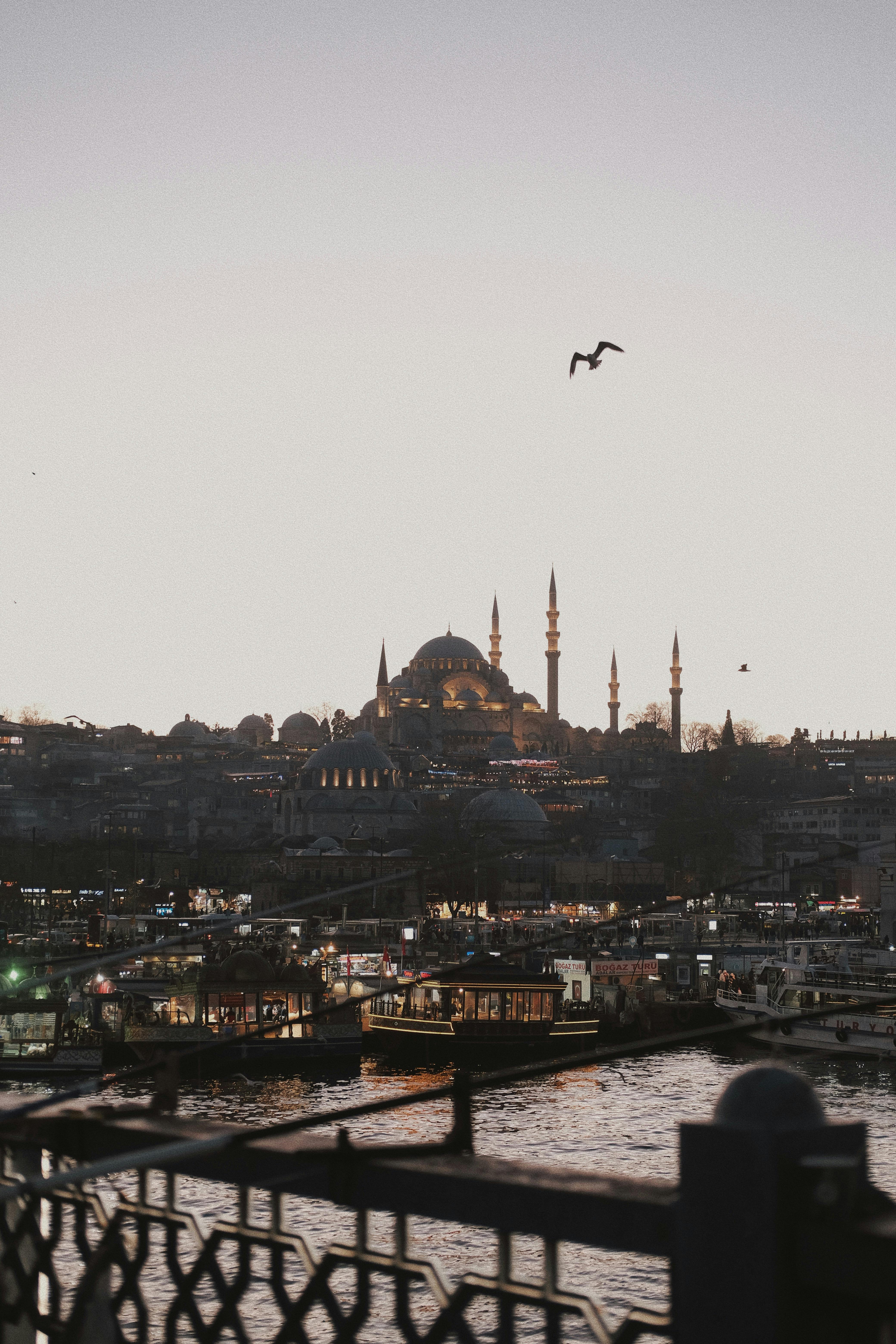 Scenic view of Hagia Sophia at dusk, capturing Istanbul's vibrant skyline and waterfront.