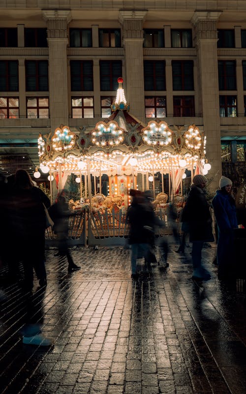 Illuminated Carousel in the Town Square at Dusk 