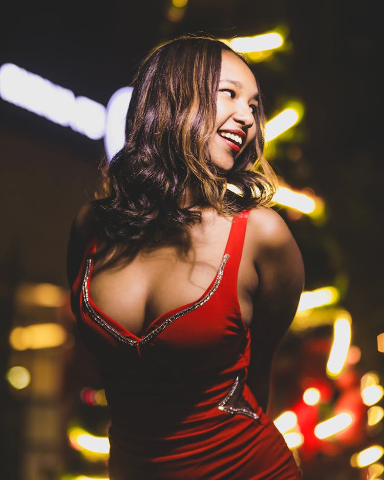 Happy Brunette Woman In Red Dress