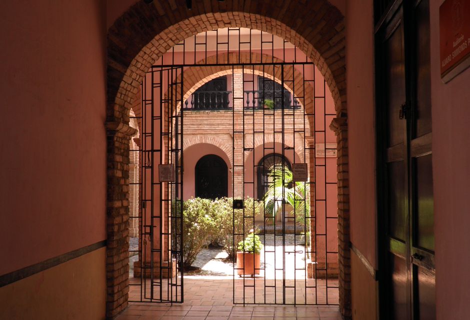 Elegant colonial archway leading to a courtyard in Popayán, Cauca, Colombia.