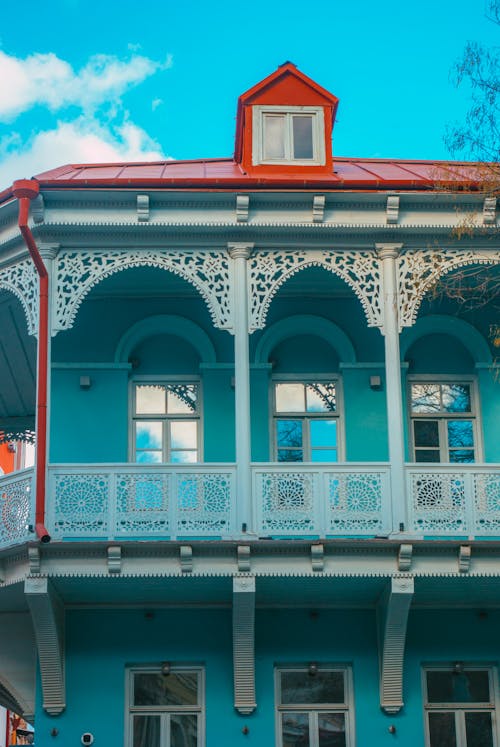 Blue Residential Building with a Balcony 