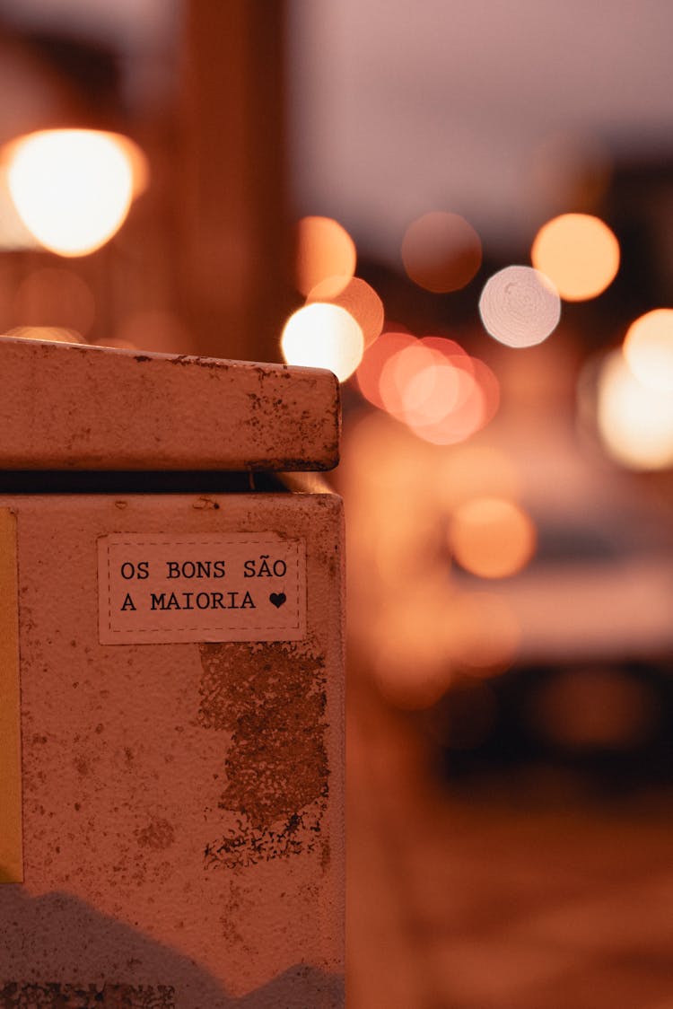 Motivational Sticker With Portuguese Text On A Wall