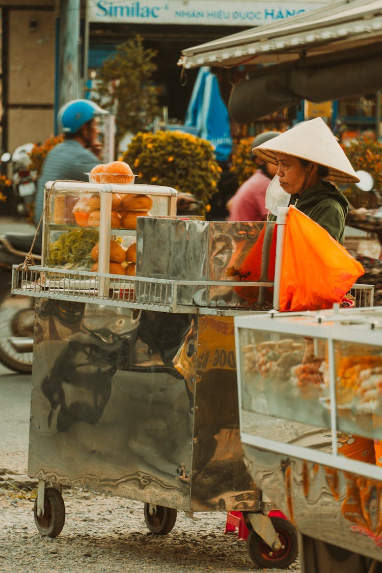 People Selling Products On Traditional Market