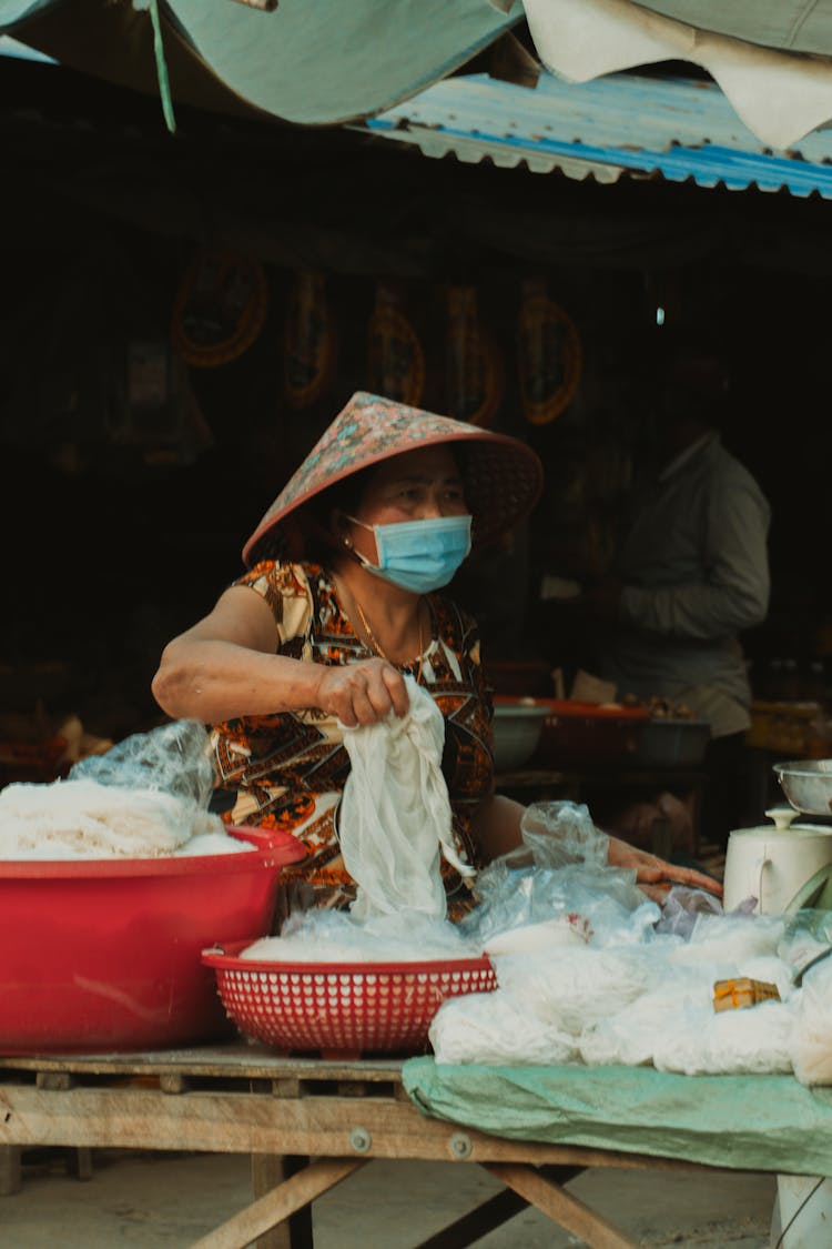 People Selling Products On Traditional Market