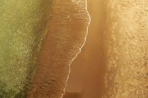Foto profissional grátis de aerofotografia, areia, beira-mar