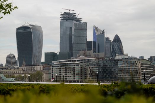 View of London's modern skyscrapers including the Gherkin and Walkie-Talkie buildings.
