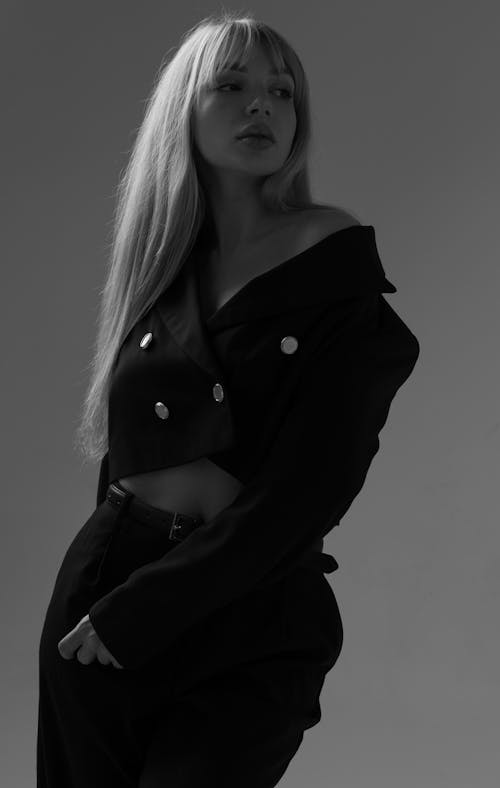 Model in Bolero Jacket and Pants Posing in Studio