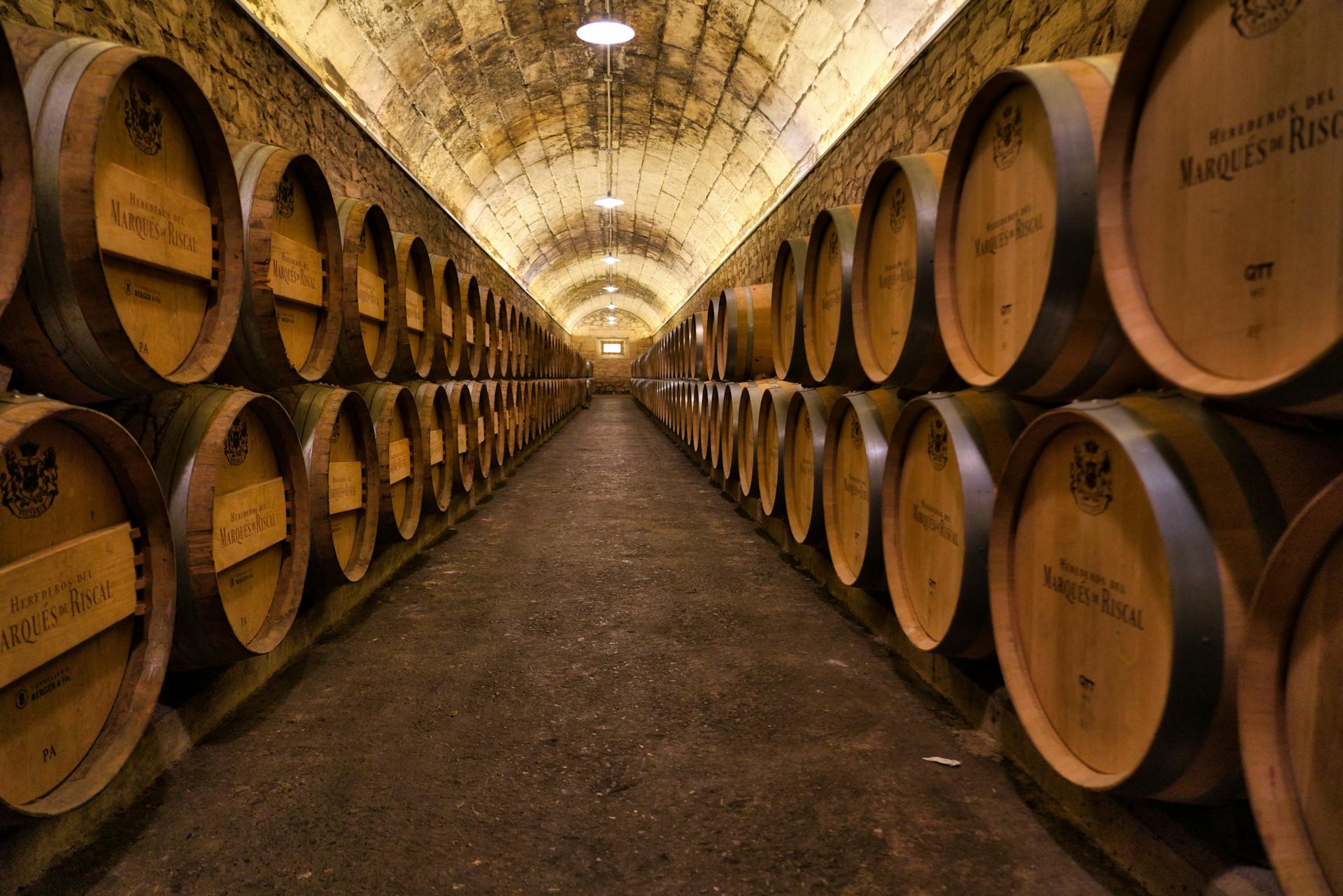 Symmetrical View of Wooden Barrels with Wine