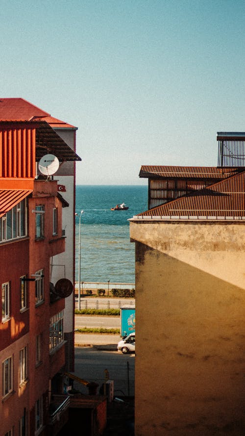 Apartment Buildings in City with the View of the Sea 