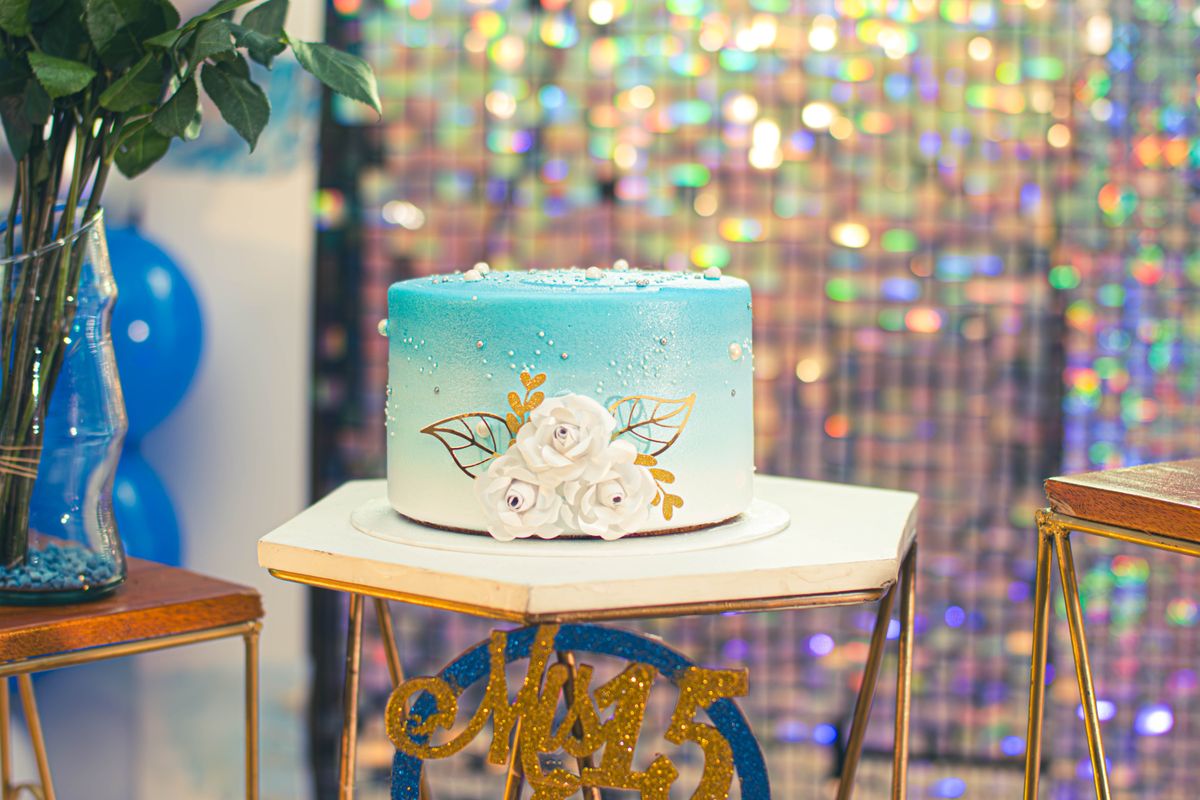 Blue gradient birthday cake with flowers
