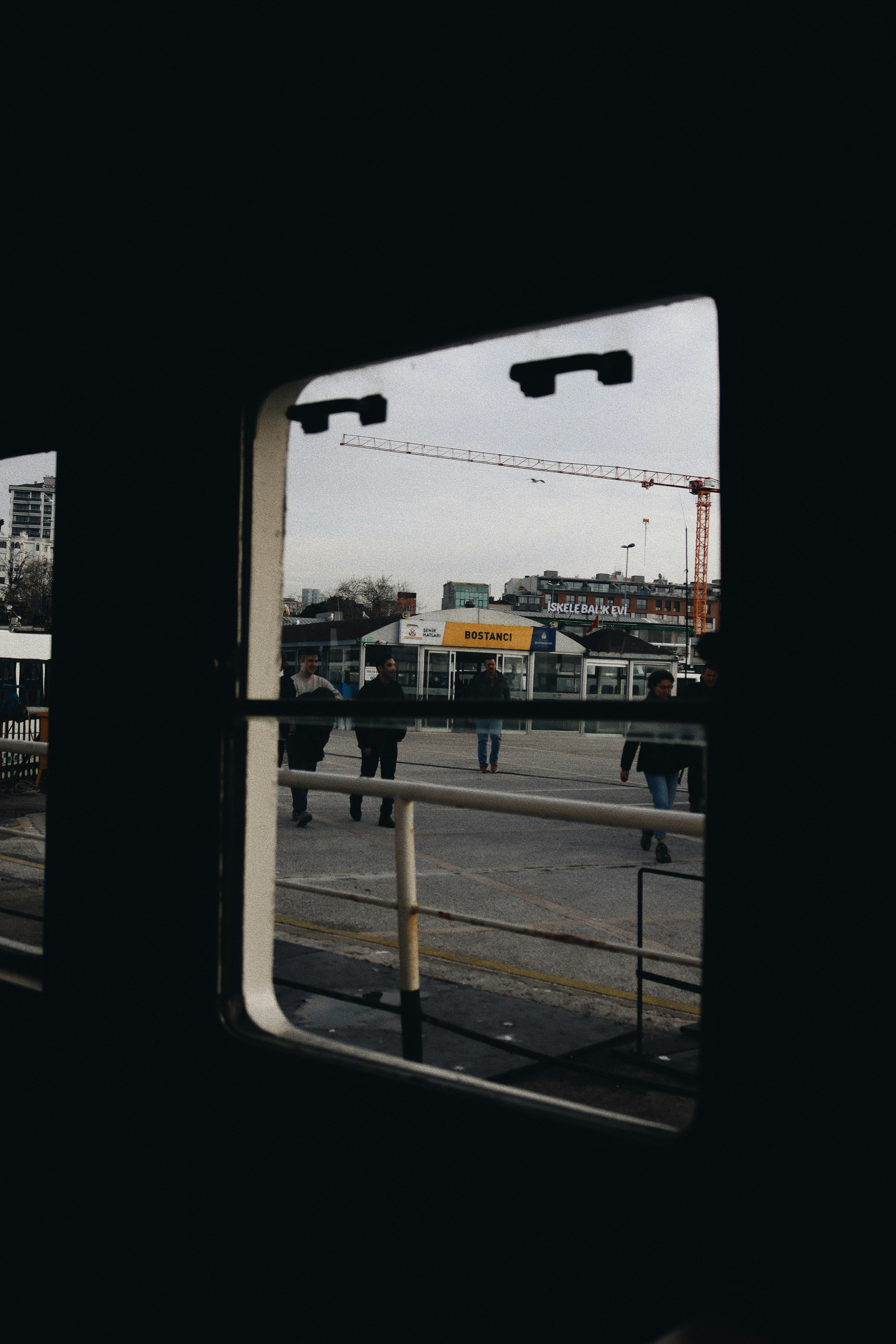 A construction crane falls onto a moving train in Thailand, killing at least 30 people
