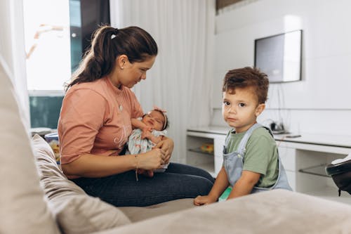 Woman with Baby Daughter and Son