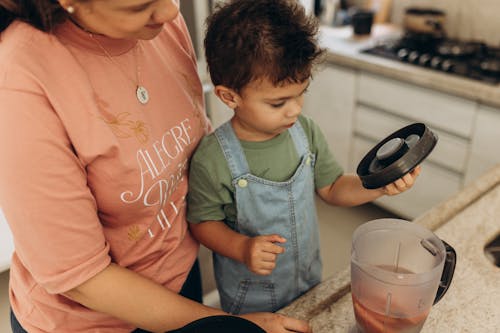 Mother Cooks with Child