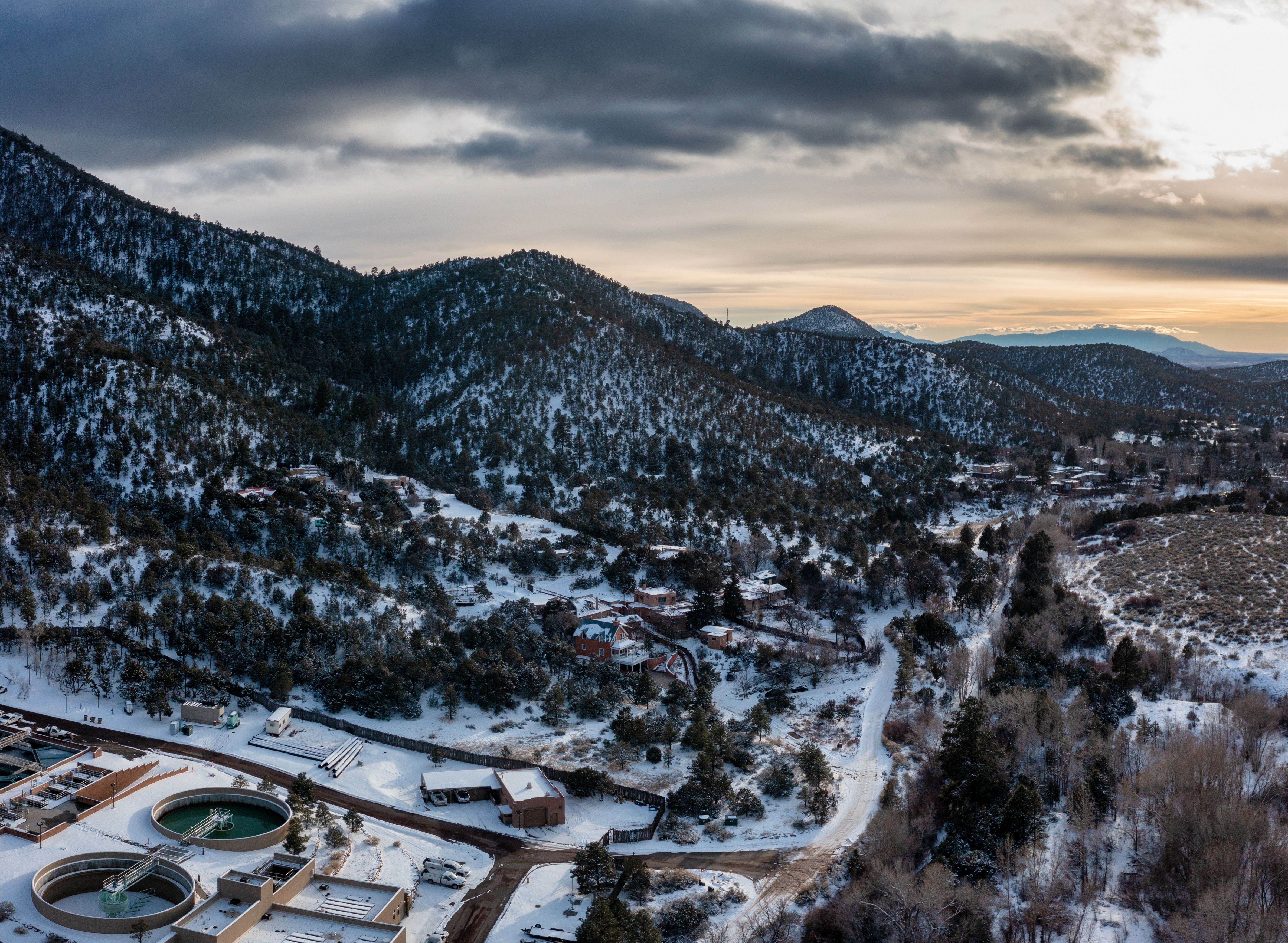 Aerial View of a Town in a Mountain Valley in Winter · Free Stock Photo