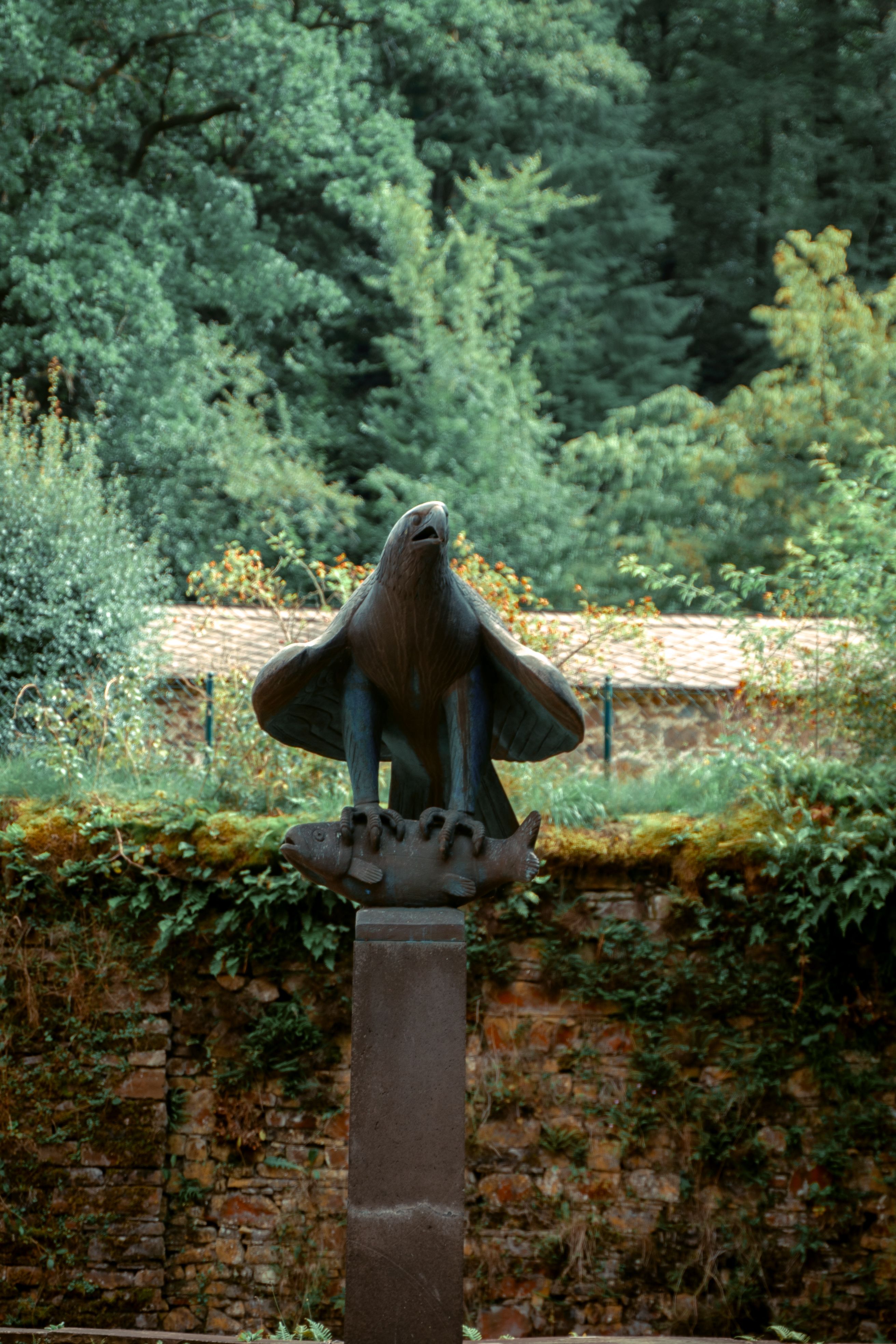 Eagle sculpture in a forest park in Morsbach, Germany.