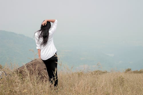 Woman Looking at Mountain View