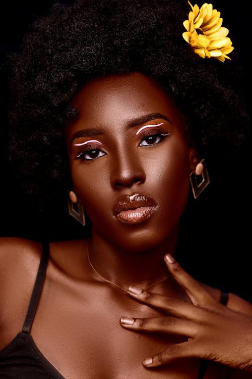 Beautiful Woman with Flower in Hair