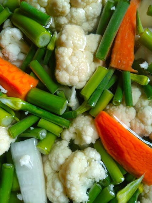 Cut Chives, Carrots, and Cauliflower