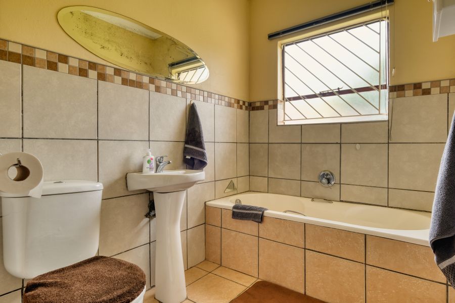 Spotless clean tiled bathroom interior