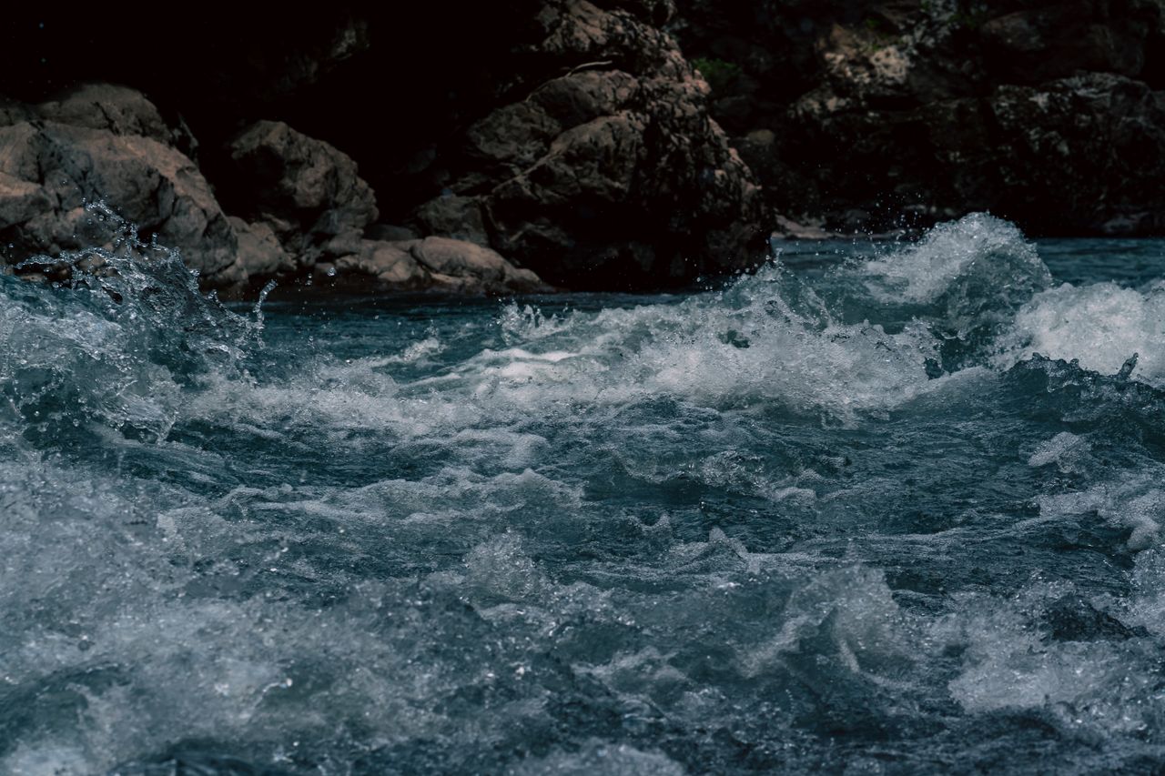 captivating view of river rapids against rocky backdrop in adygea russ