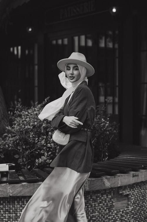 Woman Wearing Hat and Blazer in Black and White 