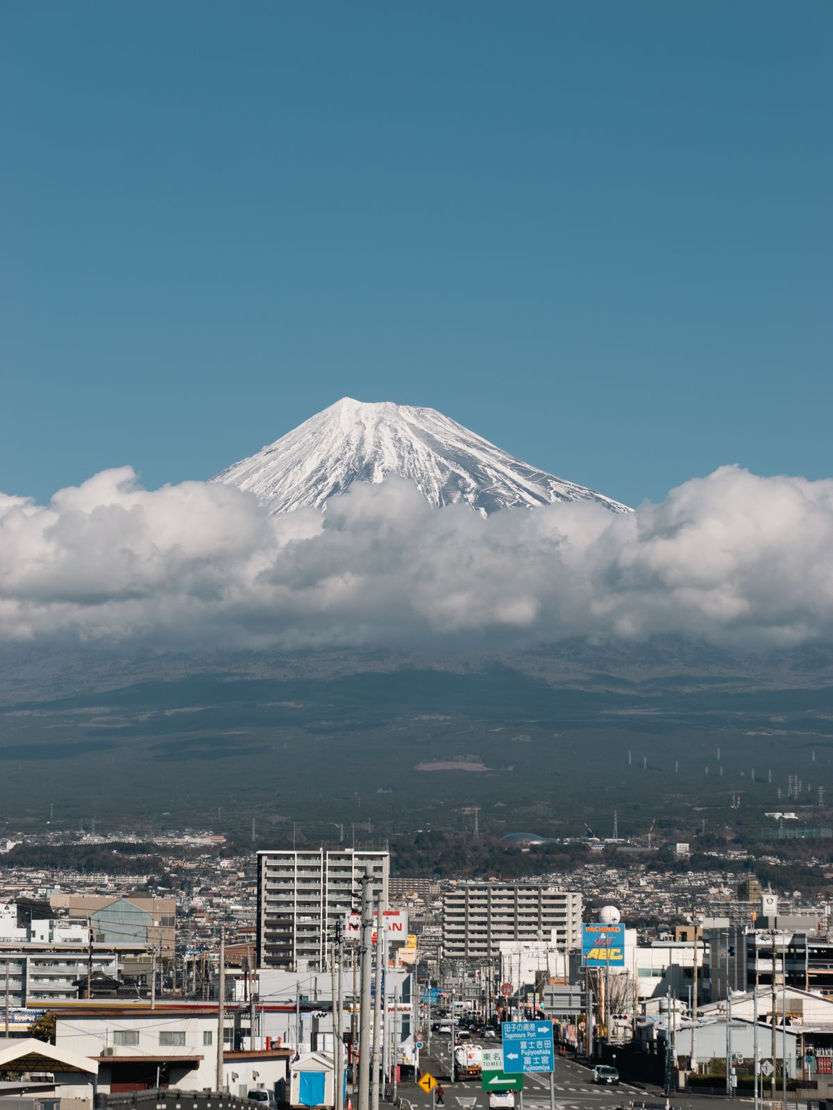 Breathtaking view of snow-capped Mount Fuji towering over the city