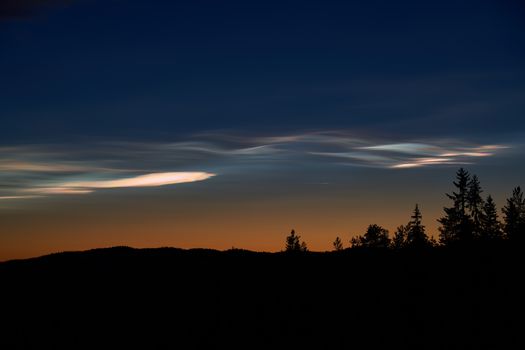 Pearl clouds on the evening sky above Krøderen Lake, Norway