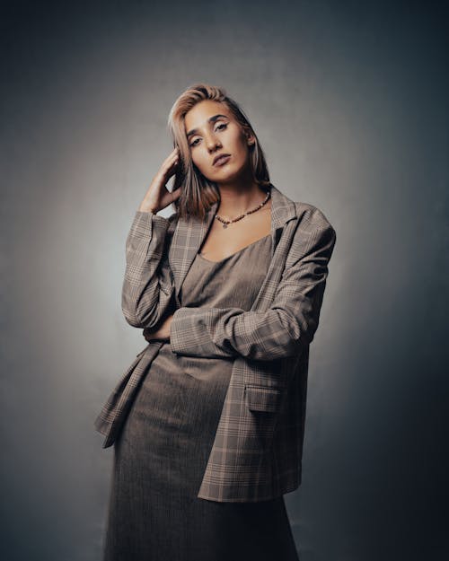 Blonde Woman Wearing Checked Suit 