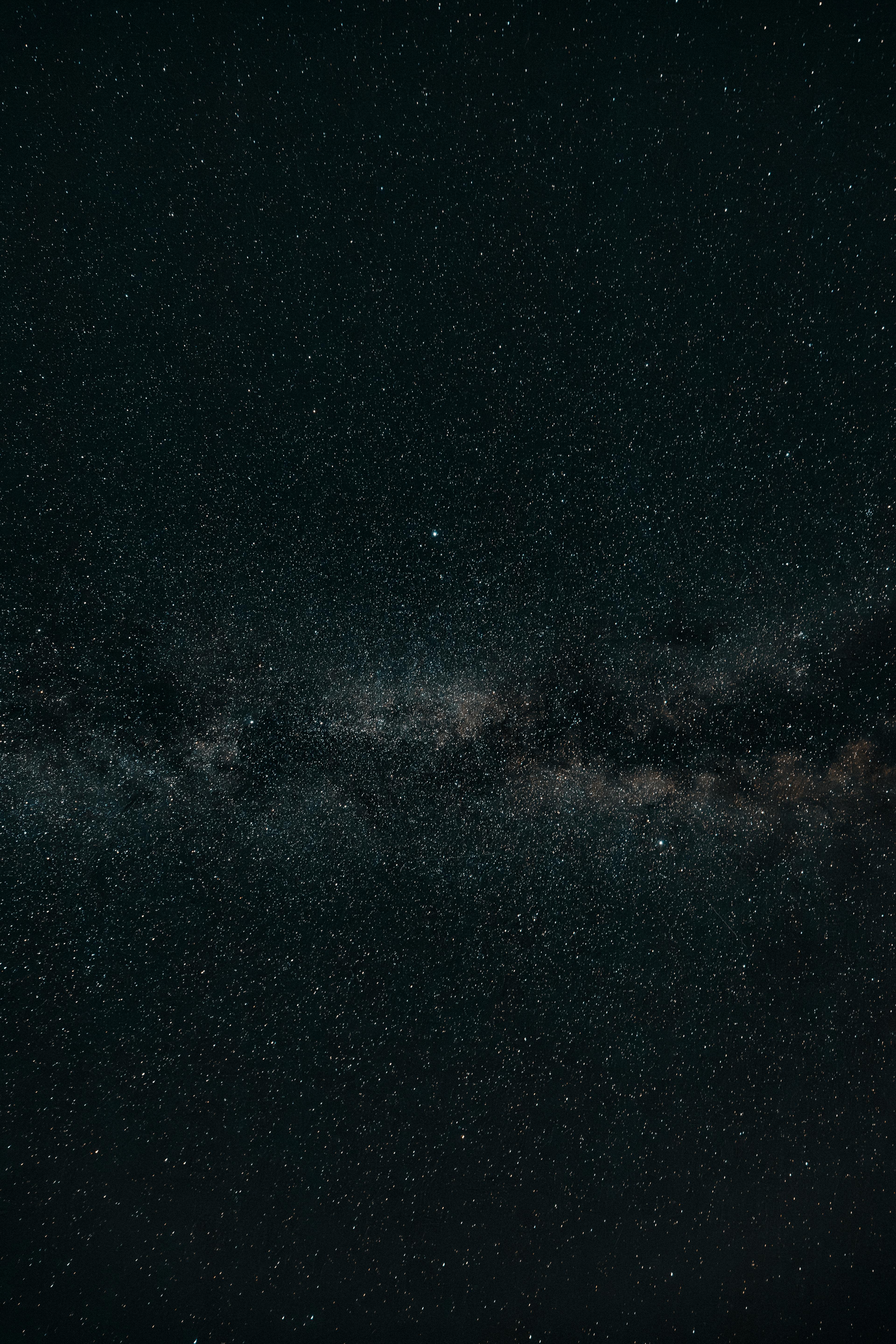 A breathtaking view of the night sky showcasing the Milky Way galaxy and a vast field of stars.