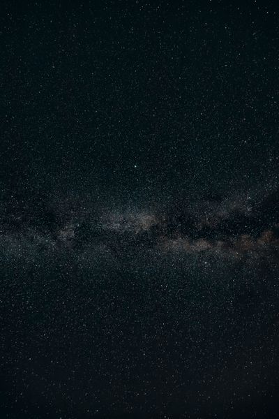 The Milky Way over a night sky, photo by eberhard grossgasteiger on Pexels