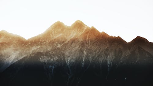 Mountains in the sunset with a white background