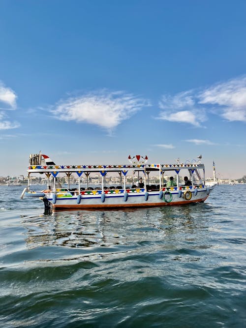 Tourboat Floating Near the Coast