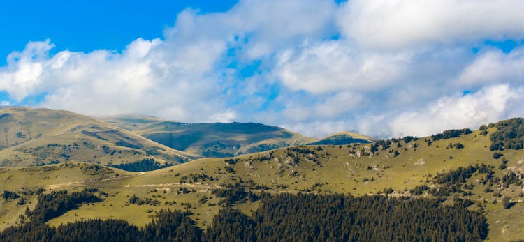 Clouds Over Forested Hills