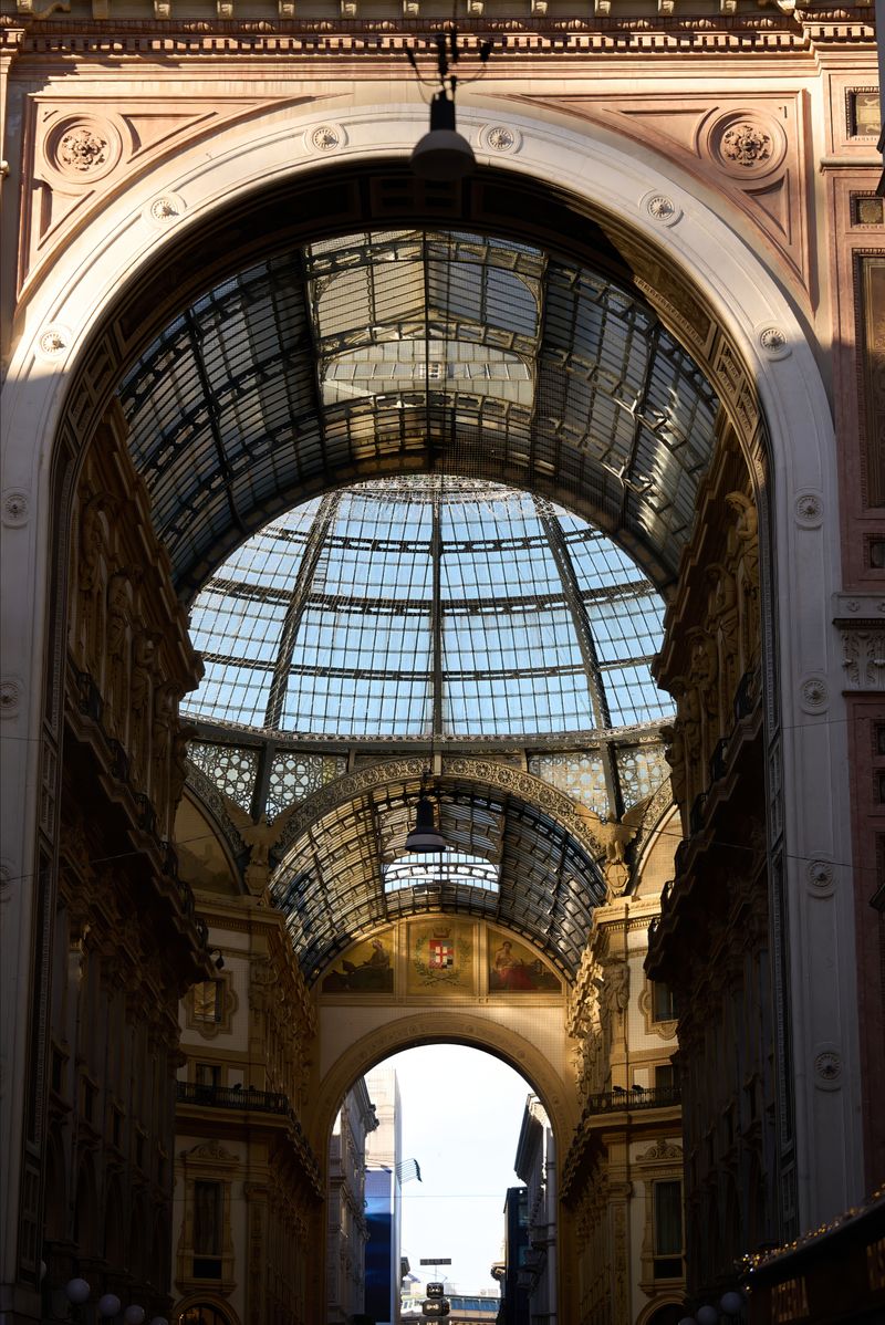 Entrance arch and glass dome of Galleria Vittorio Emanuele II in Milan