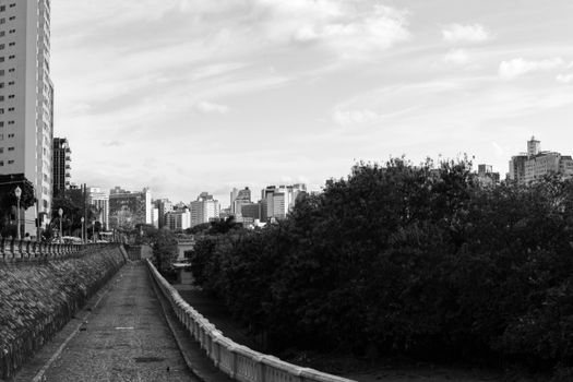Monochrome city view showcasing urban architecture and residential buildings.